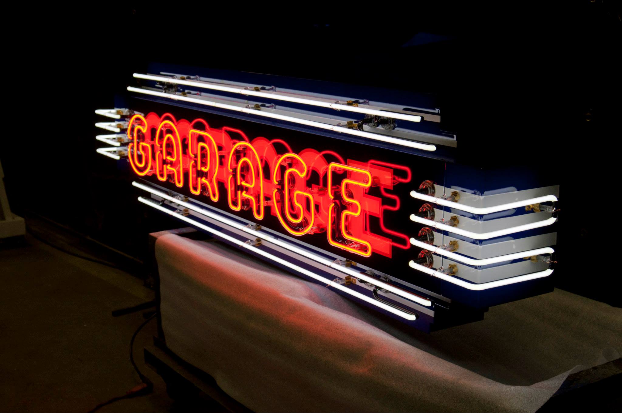 "Garage" in bold neon script1