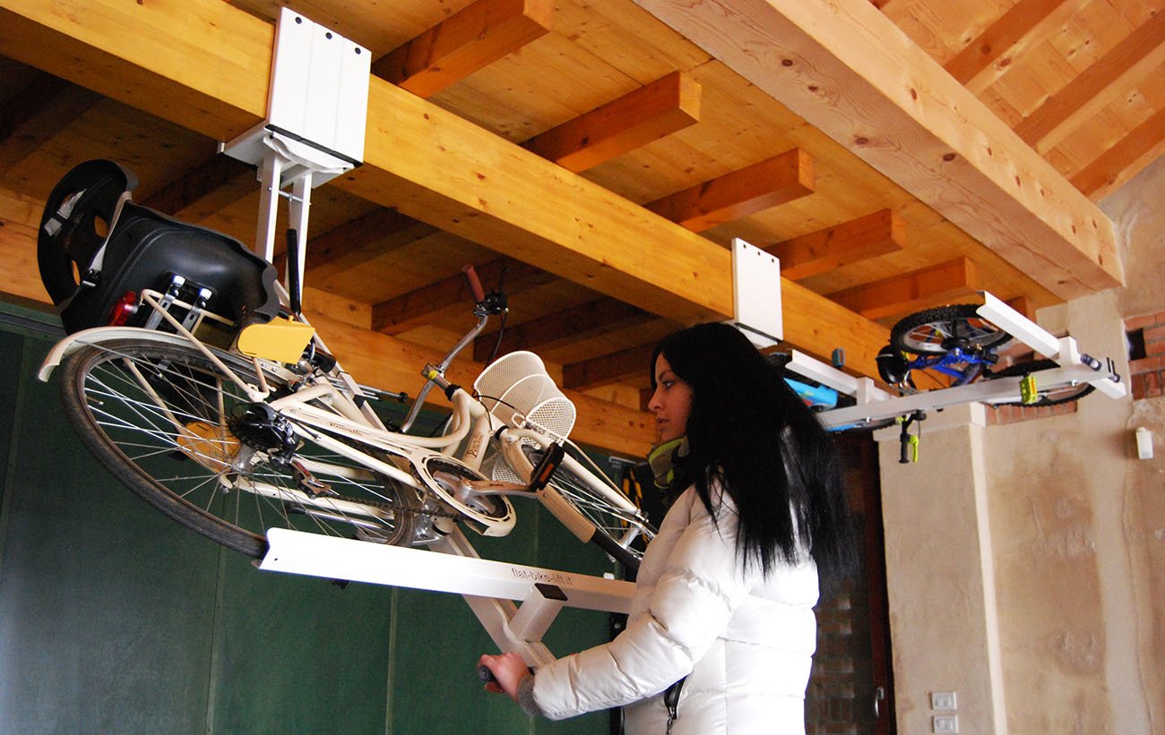 Install a ceiling-mounted bike lift
