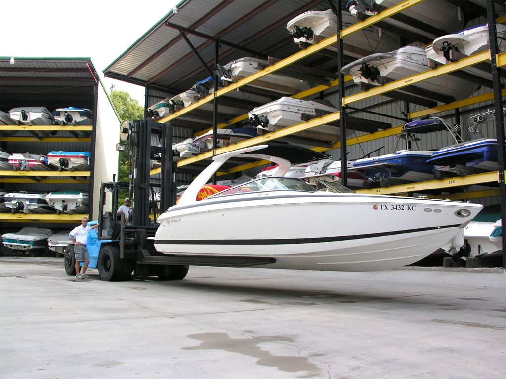 Under-boat storage compartments for maximizing space